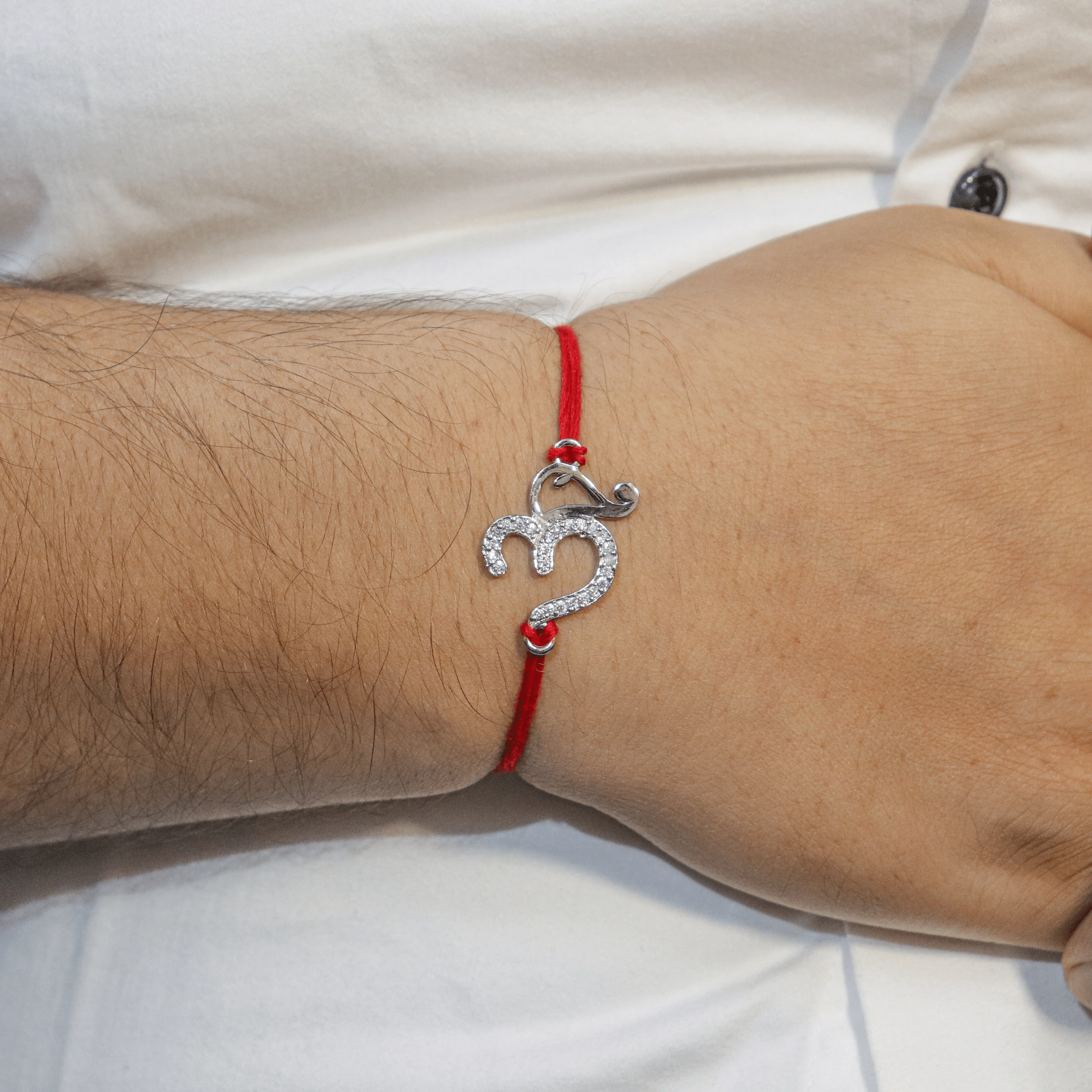 Zarkan OM AD Pure Silver Rakhi With Roli Chawal - Image 2